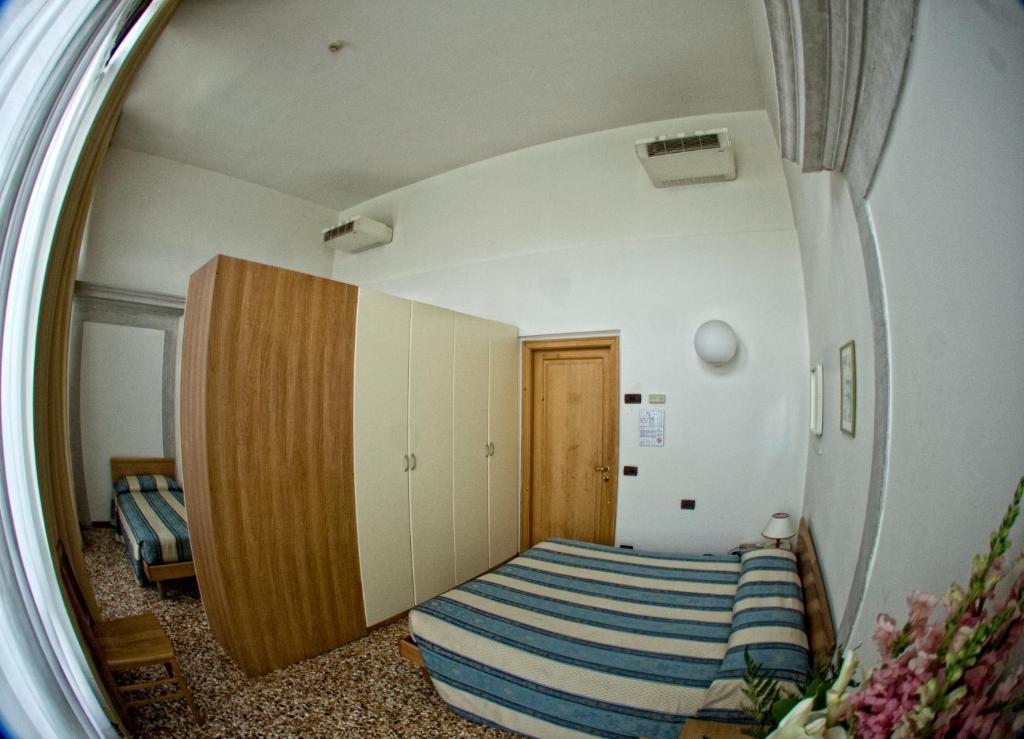 Chambre Quadruple avec Salle de Bains Commune