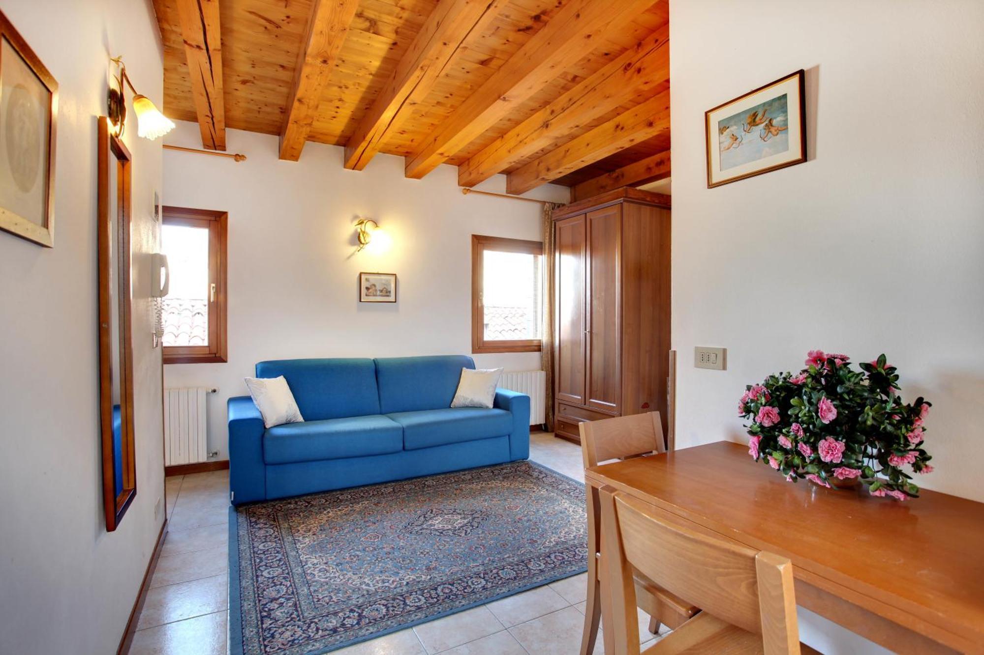 Chambre Quadruple avec Terrasse - Vue sur Canal